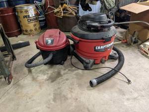 lot 320 image: Two Tube Vacuums.