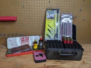 lot 159 image: Gun Cleaning and Storage Collection- Gun Cleaning Supplies, Ammo Box, & More