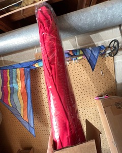 lot 194 image: Red Patio Umbrella (new in box)