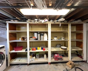 lot 303 image: Contents of Shelves (kitchenwares, window treatments)