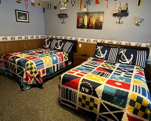 lot 13 image: #13 Sailing Guest Room