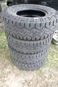 lot 193 image: Goodyear Wrangler Duratrac Tires - LT28575R18