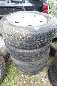 lot 196 image: Jeep Rims with Bridgestone Dueler Tires - P25570R18