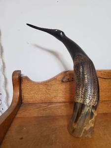 lot 105 image: Carved Horn Bird Sculpture