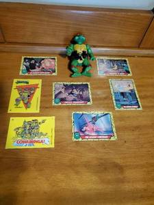 lot 149 image: Raphael Teenage Mutant Ninja Turtle Action Figure and Trading Cards