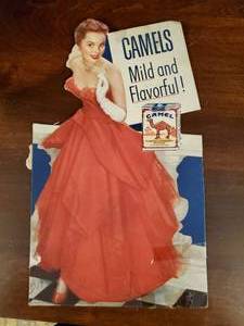 lot 219 image: Vintage Camels Mild And Flavorful Cigarette Advertisement