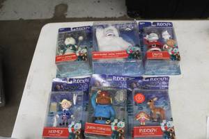 lot 411 image: Lot of (6) Rudolph the Red Nose Reindeer Action Figures (in original packaging)