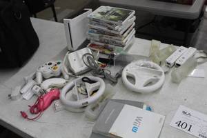 lot 401 image: Nintendo Wii Game Console with Various Controllers and Games