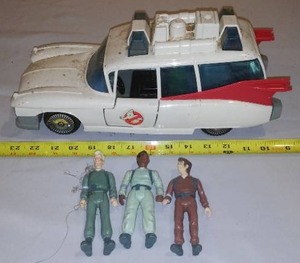 lot 465 image: ECTO  1 Ghost Busters Ambulance Car and 3 Action Figures.