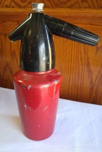 lot 333 image: Mid Century Modern Kidde Seltzer Bottle And More.