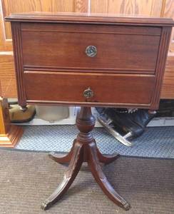 lot 352 image: Wood Sewing Cabinet with Metal Claw Feet.