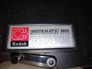 lot 380 image: Vintage Kodak Instamatic M60 Movie Projector.