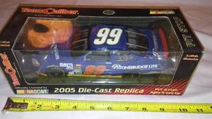 lot 393 image: NASCAR Carl Edwards IN Box #99 Stonebridge Life