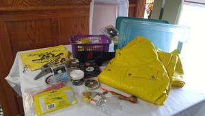 lot 327 image: Fishing Mania. Rod Saver, Tie Hooks, Rain Suit and more