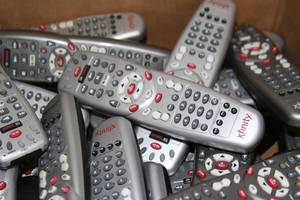 lot 88 image: Large Box of Comcast  Xfinity TV - Universal Television Remote Controls