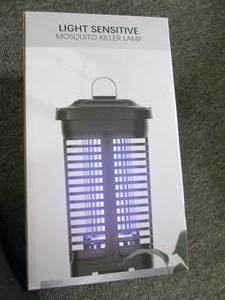 lot 145 image: new light sensitive mosquito killer...