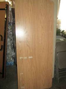 lot 406 image: 6 foot x 30 inch table with folding...