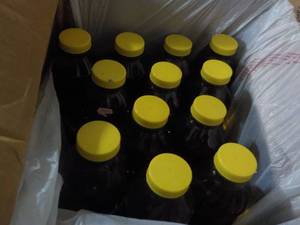 12 Bottles Pine- Sol -some leakage...