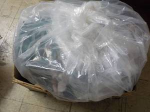 80 or so lbs. Dog Food ripped bags...