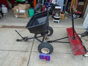 Tow behind fertilizer spreader & dethatcher. As shown.