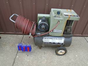 Sears air compressor with hose. Tested & works. Approx 20 gal. As shown.