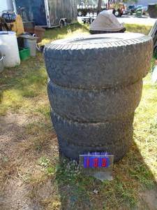 Set of 4 BF Goodrich 28575r16 tires on gm aluminum wheels. Good wheels. Tires weather checked. As shown.