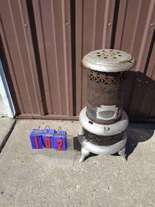 Perfection oil heater. As shown.