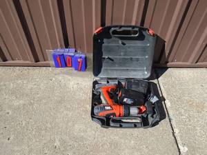 Black & Decker 18 volt drill & charger with battery. As shown.