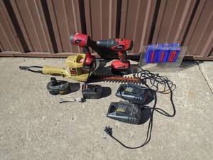 Assortment of drillschargersbatteries. Hedge trimmer condition unknown. As shown.