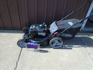 Craftsman self propelled mower with bagger. Pops but will not start. As shown.