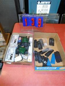 Flat of 1911 gripsheadlamp & knives. As shown.