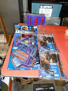 Flat of toy guns. As shown.