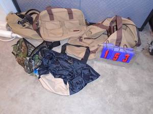 Pile of duffel & cargo bags. As shown.