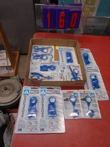 Flat of magnifing glasses & clippers. As shown.