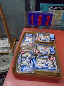 Flat of golf tees. As shown.