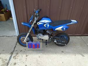 Kids gas powered mini dirt bike. Appears to run & work per consignor. As shown.