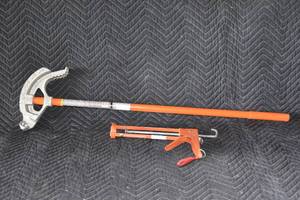 lot 41 image: 34 conduit bender and caulk gun