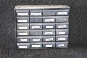 lot 76 image: Container with hardware