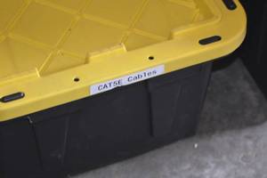 lot 100 image: HDX 17 Gallon Tough tote filled with Cat5E cables