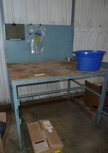 lot 13 image: Workbench 48 wide x 37 deep x 36 high with a pegboard 41 inch high back
