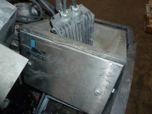 lot 39 image: Gaylord box full of volumetric feeder pieces and hose