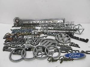 lot 18 image: Lot of Assorted Vintage etc Auto Dealer Car Emblems