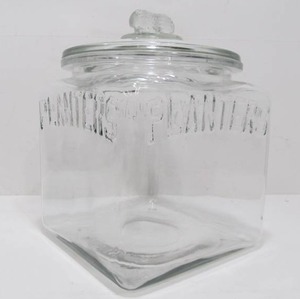 lot 175 image: Old Vintage Embossed Glass PLANTERS Peanut Jar