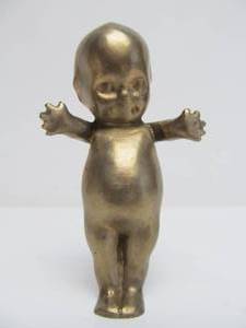 lot 73 image: Heavy Solid Brass Kewpie Doll (Hood Ornament)