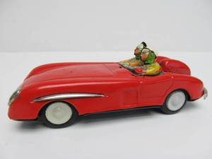 lot 70 image: Vintage Red Tin Toy Race Car wDrivers