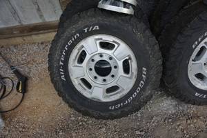 lot 27 image: 4 - BF Goodrich All Terrain TA Truck Tires and Chevy Rims
