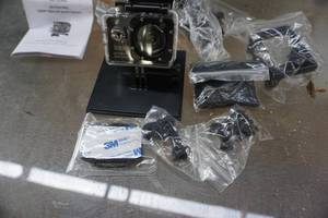 lot 38 image: Intek Brand Action Pro Go Pro Camera With Assorted Connecting and Mounting Hardware