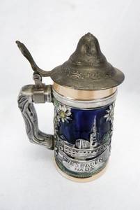 lot 29 image: Lot of 2 Vintage Covered Beer Steins