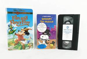 lot 103 image: Lot of Disney Fun and Fancy Free VHS Tape and Thumblina and Peanuts- Snoopy The Musical Promotional VHS Tapes