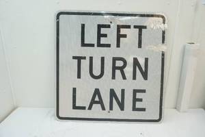 lot 67 image: Left Turn Lane Sign